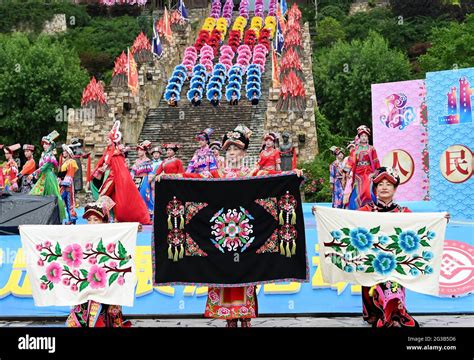 Maoxian, China. 14th June, 2021. The Qiang people are dancing to ...