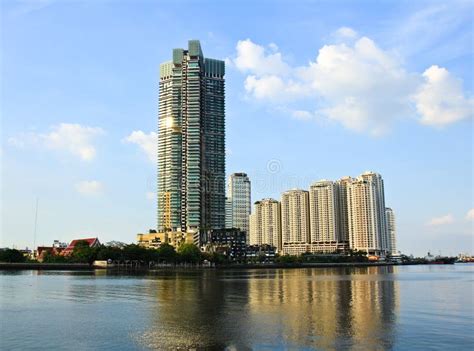 Buildings along the river. stock photo. Image of evening - 30834448
