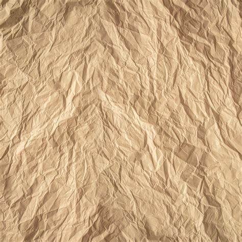 Fondo de textura de cerca de papel arrugado marrón | Foto Premium
