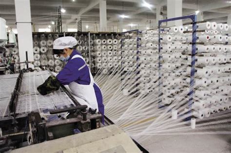 纺织业一家纺织厂在旋转高清图片下载-正版图片505291166-摄图网