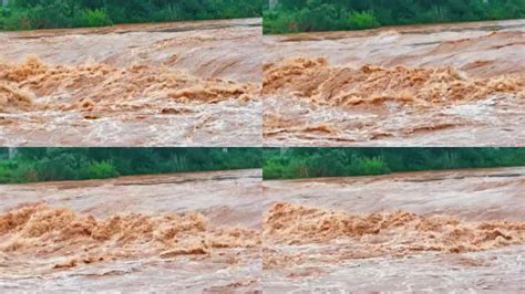 暴雨过后奔腾的河流洪水视频素材,延时摄影视频素材下载,高清1920X1080视频素材下载,凌点视频素材网,编号:646248