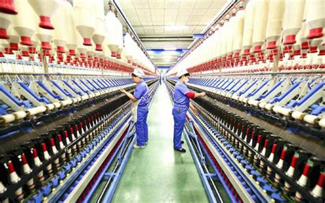 新疆沙湾：纺织企业忙生产赶订单-人民图片网