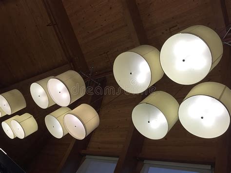 Lit Light Fixtures Hanging from the Ceiling Stock Image - Image of blue ...