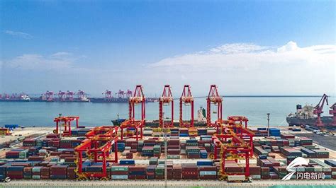 港口雄开万里流｜山东港口日照港打造全球首个顺岸开放式全自动化集装箱码头|界面新闻 · 中国