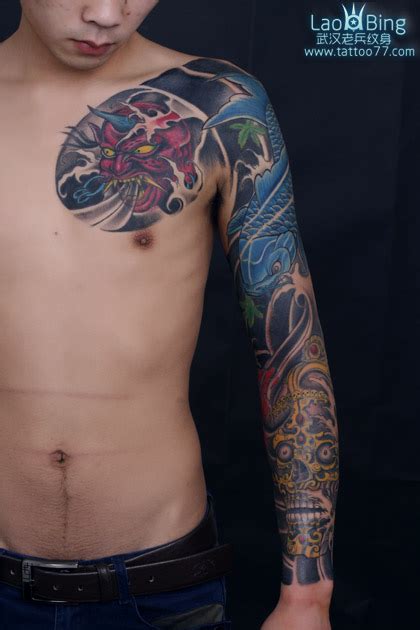 武汉专业纹身店：修改加新做--花臂半胛鲤鱼嘎巴拉纹身图案作品