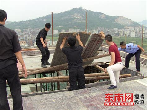 福清龙田东营村民投诉邻居13层违建高楼引发安全问题-新闻中心-南海网