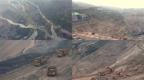 露天铁矿及重型采矿设备鸟瞰图。视频素材_ID:VCG42N1347852178-VCG.COM