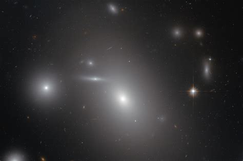 NGC 4889: Hubble Focuses on Distant Elliptical Galaxy | Sci.News