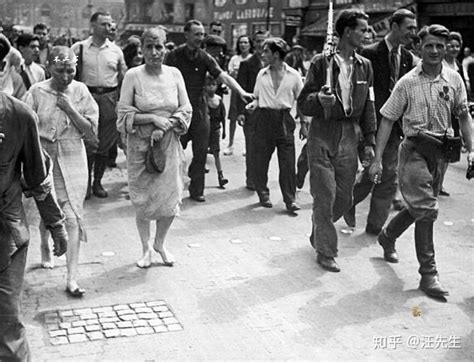 二战老照片：战时与德军有染的法国女性被清算、遭到剃光头发游街 - 知乎
