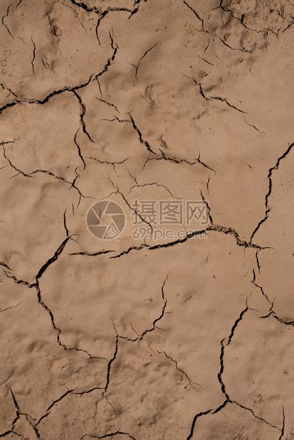 棕色干燥碎裂泥土作为背景纹理高清图片下载-正版图片306888085-摄图网
