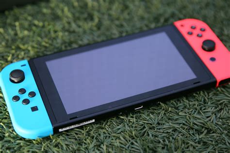 任天堂 Switch OLED游戏机评测：更大、更好的显示屏和出色的支架_游戏机_什么值得买