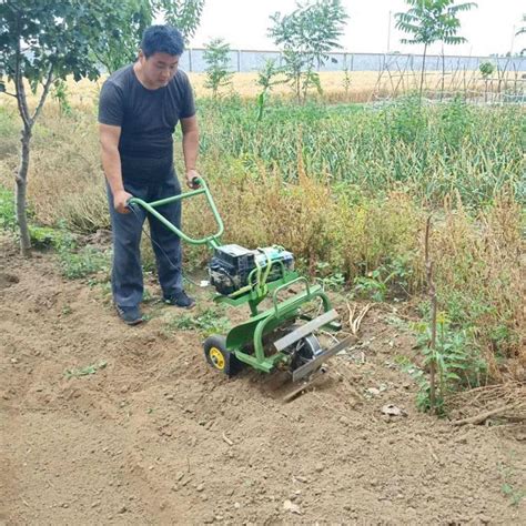 农用锄地微耕机 四轮电动割草机 多功能小型果园菜地除草松土机-阿里巴巴