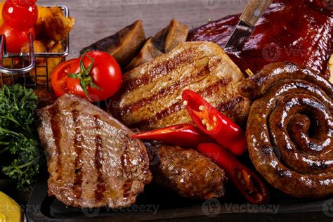 Grilled meat mix plate 7683603 Stock Photo at Vecteezy