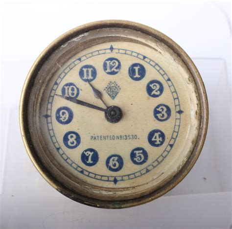 A British United Clock Company car clock, (patent no. 13530), together ...