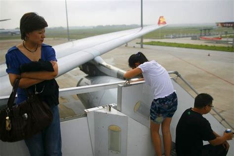13838--海航航班延误22小时 乘客被弃机舱内_梦多_新浪博客