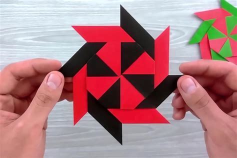 怎么折纸八角双色飞镖/风车的折法图解教程_爱折纸网