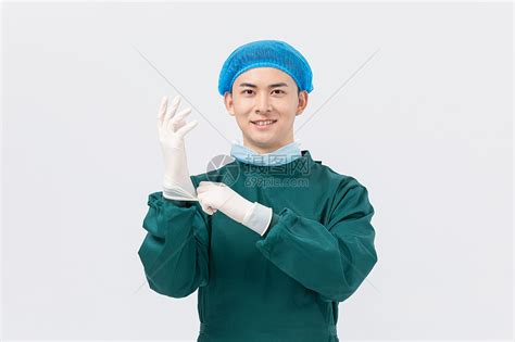 外科医生戴手套高清图片下载-正版图片501463290-摄图网