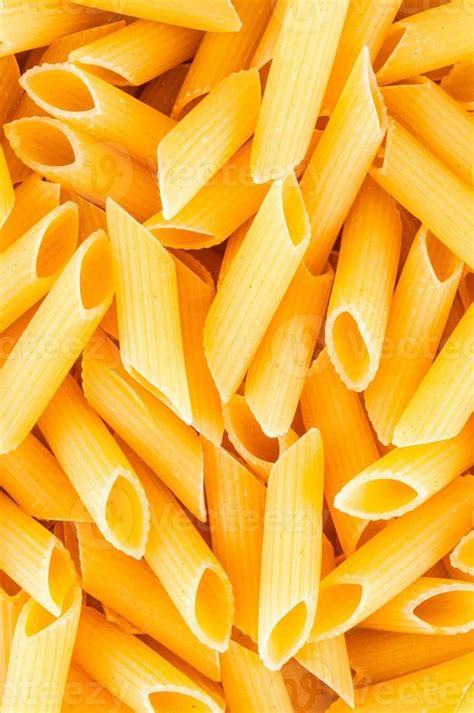 Dry penne pasta 20987844 Stock Photo at Vecteezy