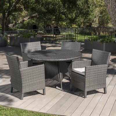 Wade Logan® Basabi 4 - Person Round Outdoor Dining Set with Cushions ...