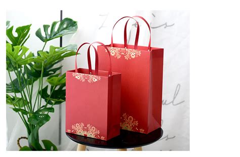 中国风礼品袋喜庆礼盒包装袋中秋端午节铆钉纸袋满月伴手礼回礼袋-阿里巴巴