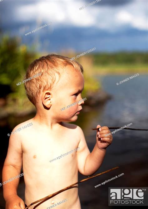 Shirtless boy holding stick, Stock Photo, Picture And Royalty Free ...