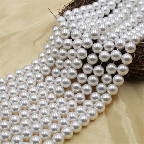 天然淡水两面光珍珠6-7mm手工DIY串珠 混彩色米型淡水珍珠散珠-淘宝网