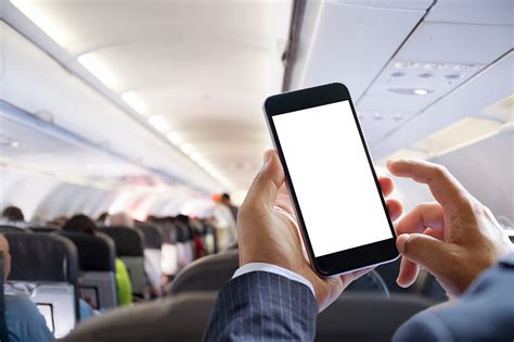 飞机,乘客,智能手机,派对主人,设备屏幕,显示器,便携式信息设备,机场,着装得体,商务旅行,摄影素材,汇图网www.huitu.com
