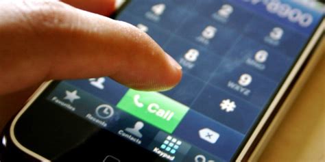 businessman dialing phone - Communications Solutions, Inc. Jacksonville ...