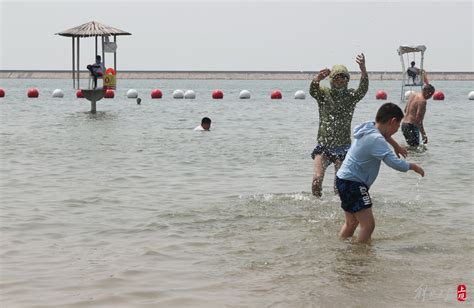 实拍!上海这处海滨浴场玩法很多!游客却不多——上海热线消费频道
