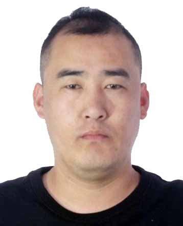 梁洪源图片