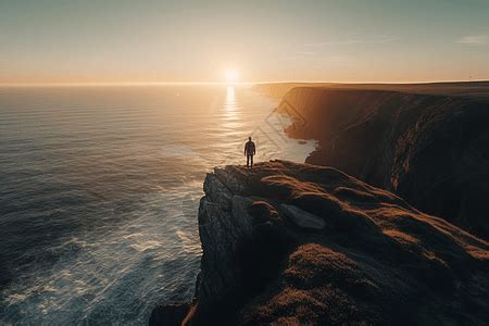 一个人站在悬崖上等着看日出高清图片下载-正版图片600044240-摄图网