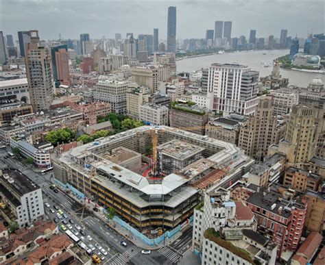 跨越百年的围合！老市府大楼的前世今生：上海第一面五星红旗曾在这里升起 | 新民老照片_新民社会_新民网