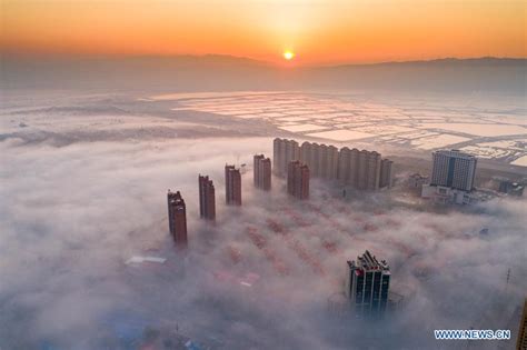 Aerial photos show fog floating above Yuncheng City in north China ...
