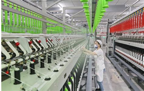 江苏南通：国内首个10万锭智慧纺纱工厂建成达产-人民图片网