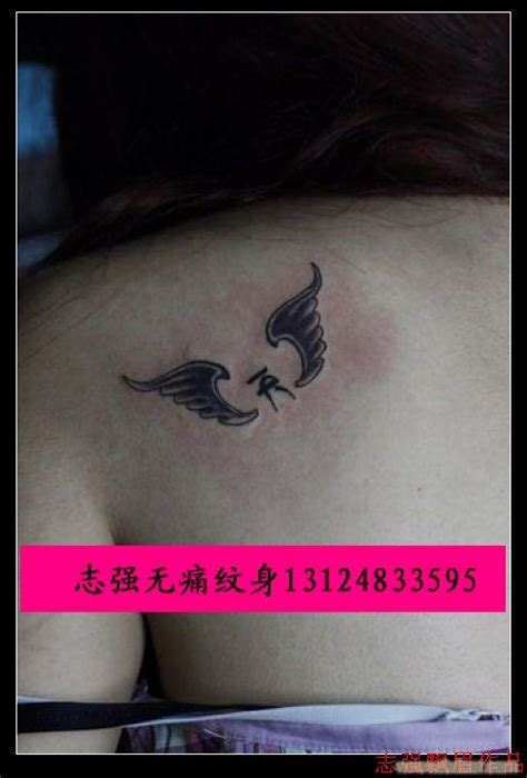 上海纹身由龙作品女生后腰纹身