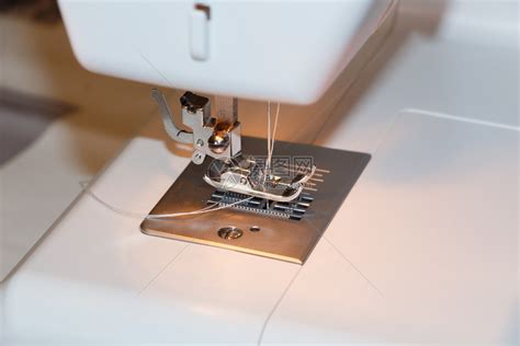 服装修理工作缝纫机针上的特写高清图片下载-正版图片307507754-摄图网