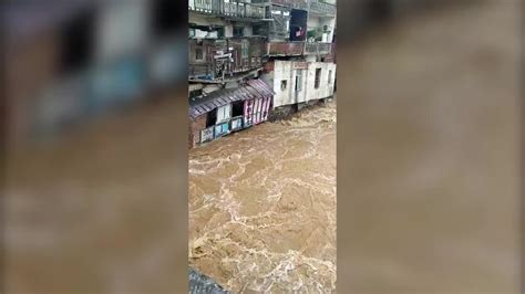航拍广东英德水边镇洪峰过境：洪水漫出河道 房屋被淹成孤岛_腾讯视频