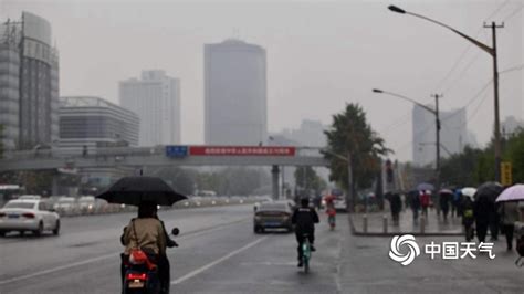 雨中告别三伏天 北京今晨迎降雨影响早高峰-图片频道