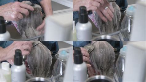 一位专业护理造型师在家洗头时，在厨房水槽中清洗一位老年高加索女性的白头发和灰头发_3840X2160_高清视频素材下载(编号:8234137 ...