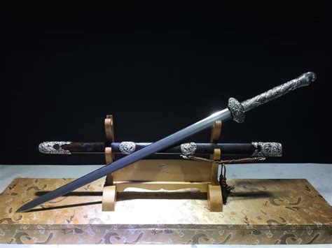 白铜三枚九龙剑：售价3400、尺寸、全长106cm 、韧长76cm 柄长30cm 韧宽3.6cm，厚0.85cm 、带鞘全重2.26Kg、净重 ...