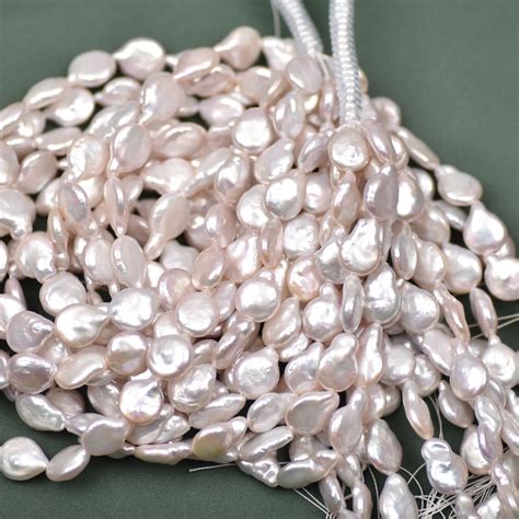 光滑巴洛克水滴珍珠散珠9-10mm天然强光纽扣带尾巴异形珍珠批发-阿里巴巴
