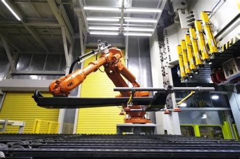 ABB机器人的冲压自动化生产线_智能机器人_AI资讯_工博士人工智能网
