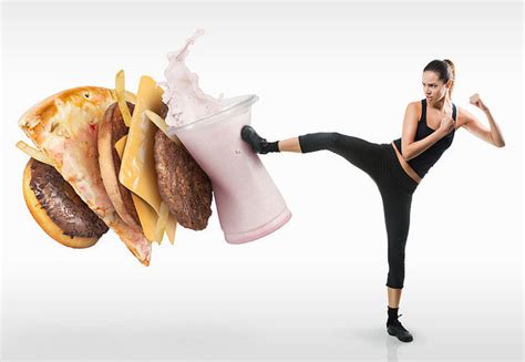 健康饮食节食减肥和减肥概念饮食节食的概念减肥卷尺缠绕在手臂上另一方面是汉堡包高清图片下载-正版图片507442035-摄图网