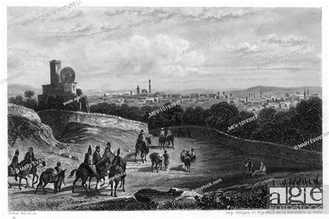 Distant view of Damascus, with travellers approaching on horseback ...