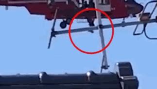 看着都晕！女子被直升机救援时担架在空中猛烈旋转175次_新浪新闻