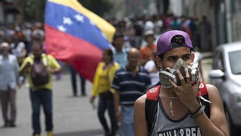 委内瑞拉经济深陷苦难 但华尔街却盯上了该国债券|界面新闻 · 天下