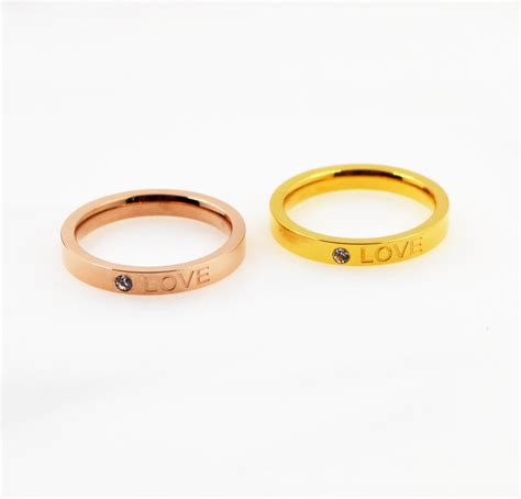 新款时尚LOVE字母带钻戒指 时尚情侣款钛钢玫瑰金镶钻指环饰品-阿里巴巴
