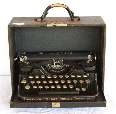 At Auction: Underwood Portable Typewriter with Case