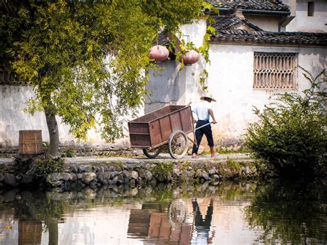 Tourists visit ancient village Hongcun in E China