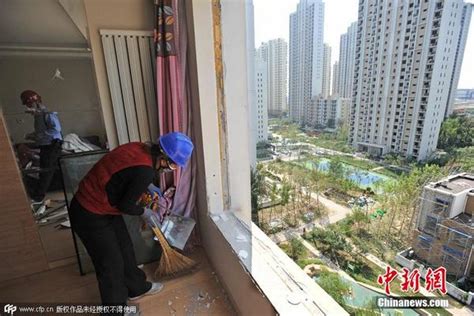 天津滨海新区爆炸 受灾小区启动维修|小区|维修_凤凰资讯